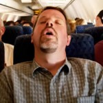 funny snoring - man snoring in the airplane